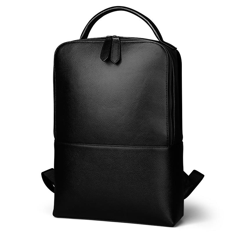 Slim black pebbled leather backpack with minimalist design, premium Alpine-Nordic style