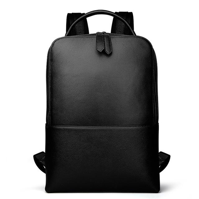 Black leather backpack on a white background