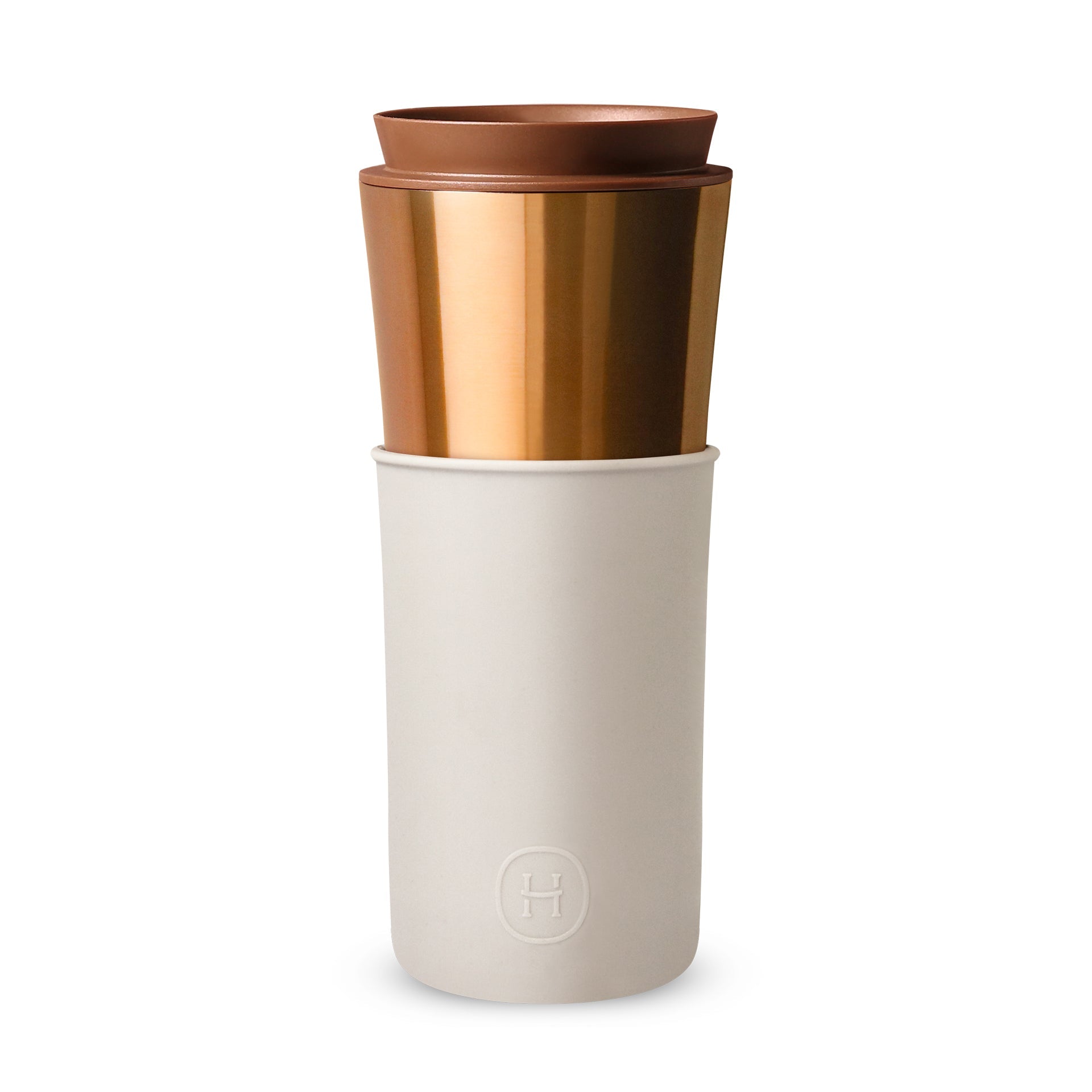 Two-toned travel mug with bronze top and white bottom on a white background