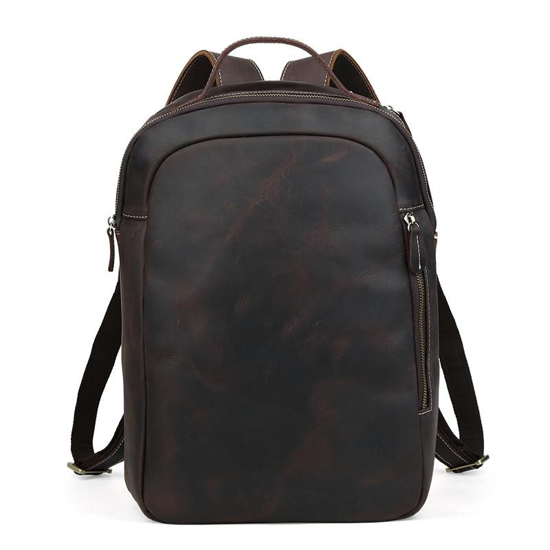 Minimalist dark brown leather backpack with front zipper, Alpine-Nordic Swiss design