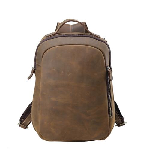 Minimalist brown leather backpack with Alpine-Nordic design, Swiss quality craftsmanship.