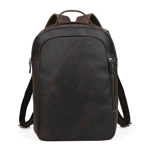 Minimalist dark brown leather backpack with zippered pockets, Alpine-Nordic lifestyle design